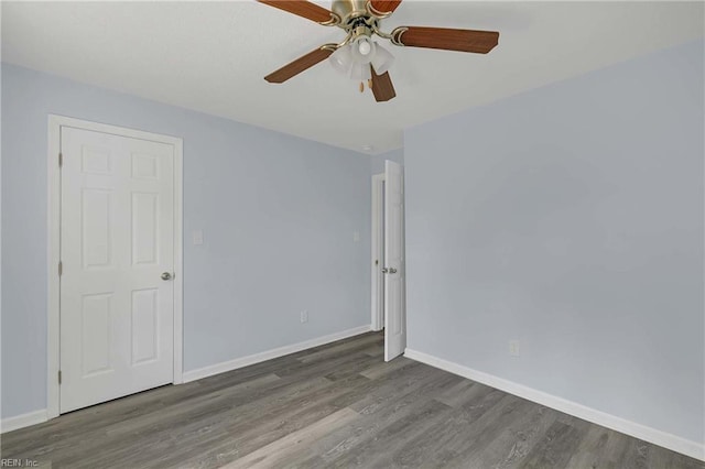 2111 Jenkins Neck Rd, Hayes, VA 23072 - empty room with wood finished floors, a ceiling fan, and baseboards