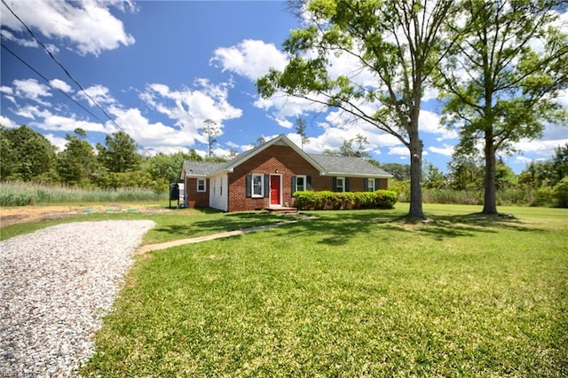 2111 Jenkins Neck Rd, Hayes, VA 23072 - ranch-style house featuring brick siding, a front yard, and driveway
