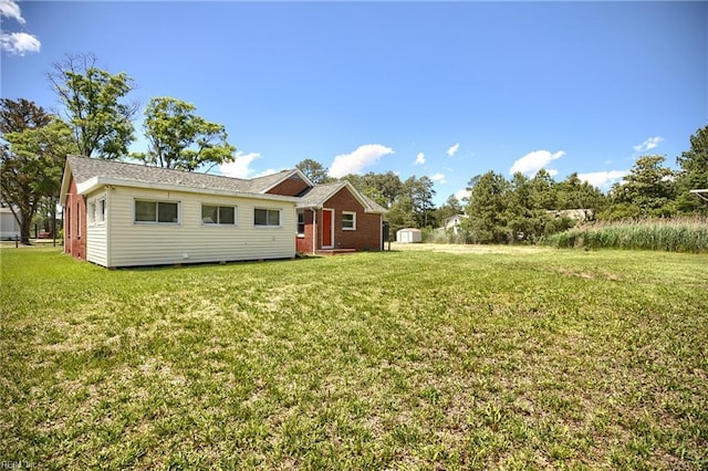 2111 Jenkins Neck Rd, Hayes, VA 23072 - rear view of property featuring a yard