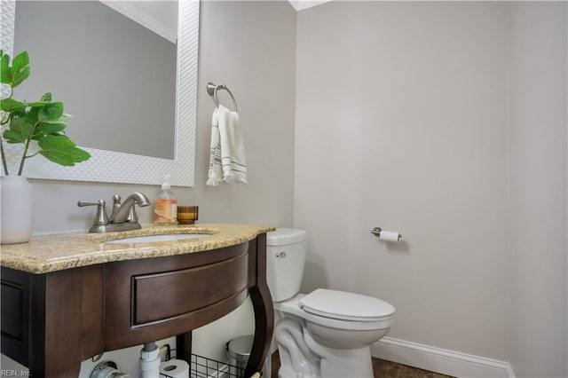 6 Hastings Ln, Williamsburg, VA 23188 - bathroom featuring ornamental molding, toilet, vanity, and baseboards