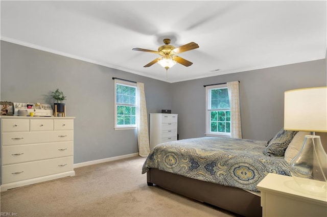 6 Hastings Ln, Williamsburg, VA 23188 - bedroom with multiple windows, crown molding, light carpet, baseboards, and a ceiling fan