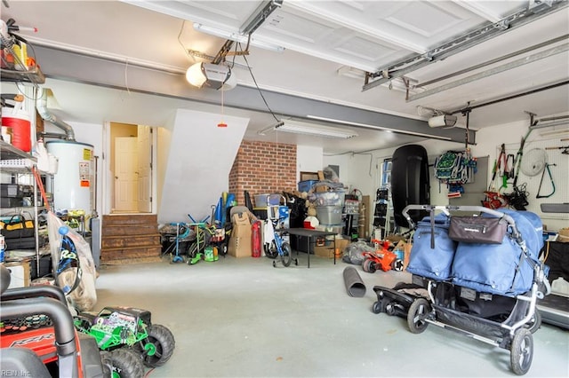 6 Hastings Ln, Williamsburg, VA 23188 - garage featuring gas water heater and a garage door opener