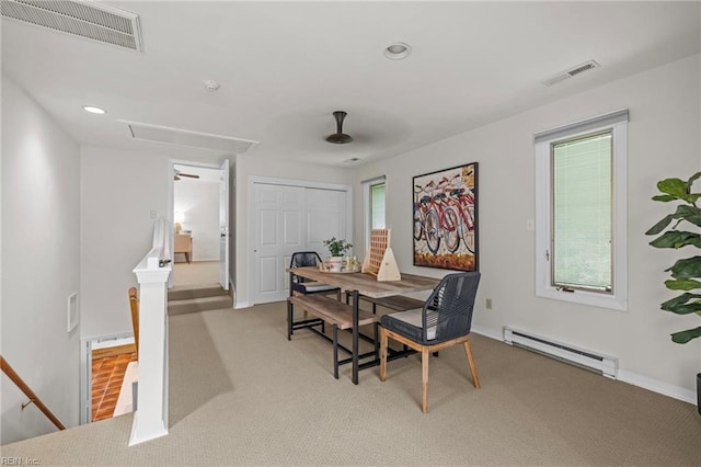 dining room featuring attic access, a baseboard radiator, light colored carpet, recessed lighting, and baseboards