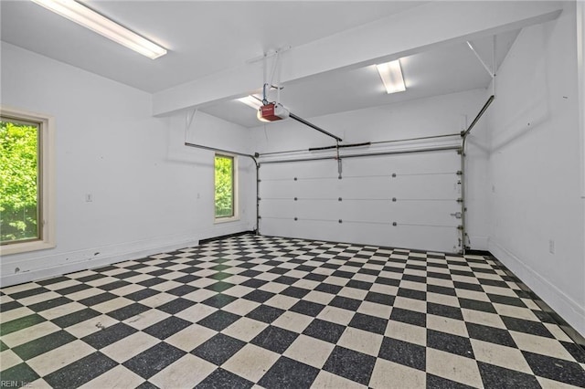 garage featuring a garage door opener