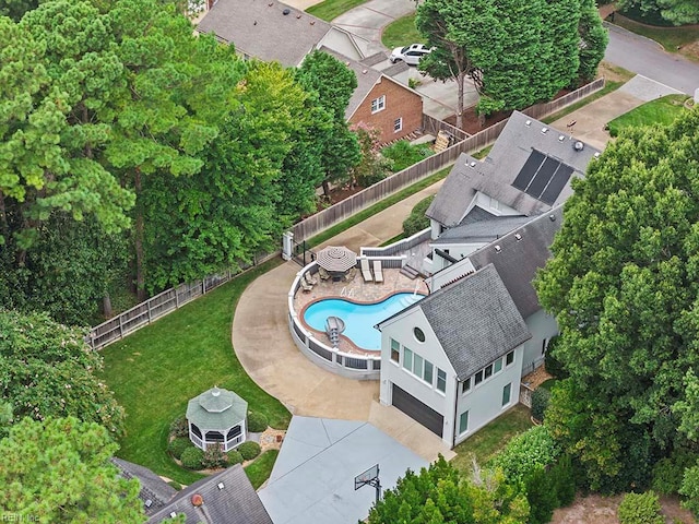 drone / aerial view of a pool
