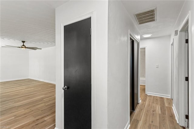 7709 S Quay Rd, Suffolk, VA 23437 - hall featuring light wood-style flooring and baseboards