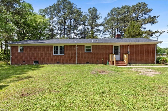 7709 S Quay Rd, Suffolk, VA 23437 - rear view of house featuring crawl space, a yard, and entry steps