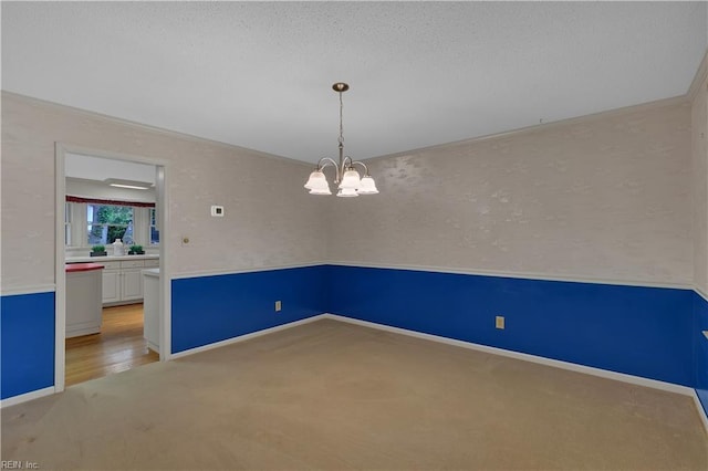 5 Bessies Landing Dr, Poquoson, VA 23662 - carpeted empty room featuring a chandelier and baseboards