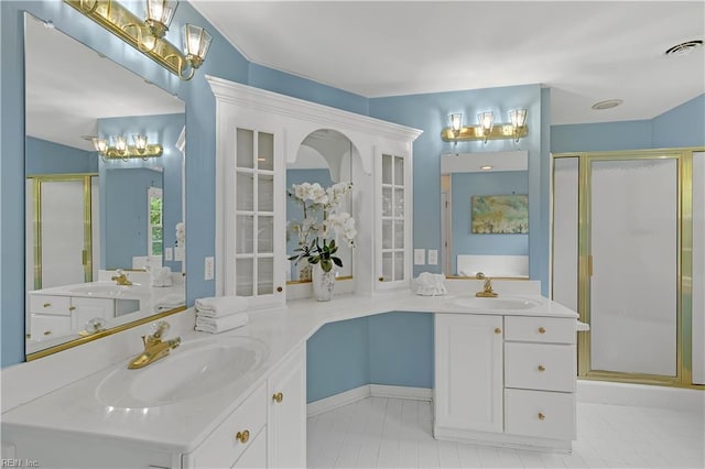 5 Bessies Landing Dr, Poquoson, VA 23662 - bathroom featuring a shower stall and two vanities