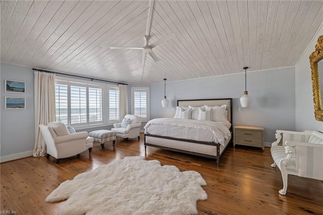 bedroom featuring wooden ceiling, baseboards, hardwood / wood-style floors, a ceiling fan, and ornamental molding
