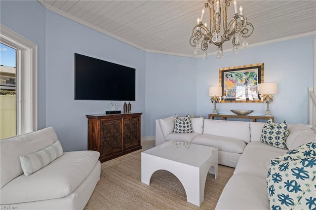 carpeted living room featuring a chandelier and crown molding