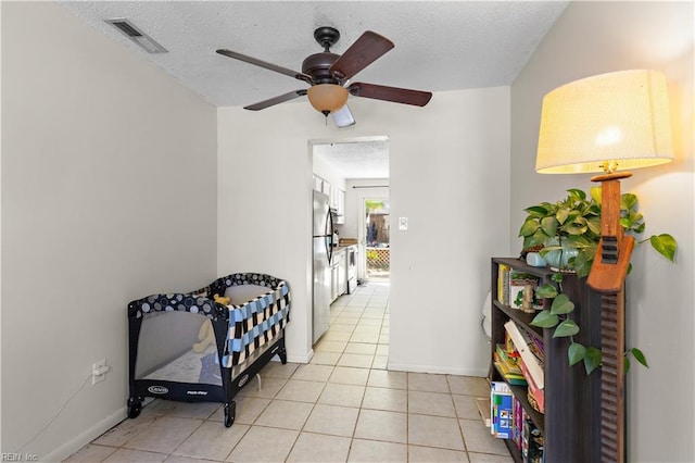 3667 Smokey Chamber Dr, Virginia Beach, VA 23462 - hall with light tile patterned flooring, a textured ceiling, and baseboards