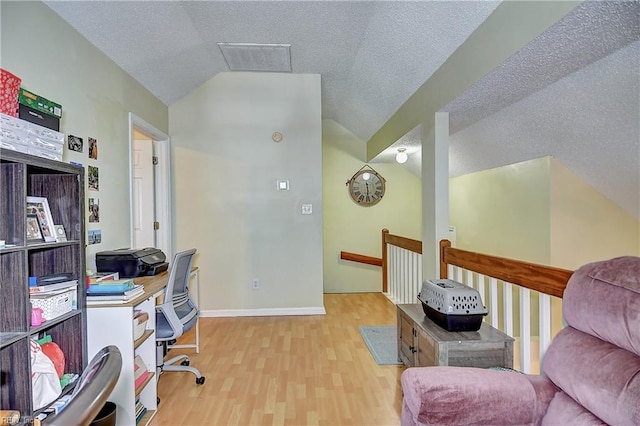 841 Masters Trl, Newport News, VA 23602 - office with vaulted ceiling, wood finished floors, a textured ceiling, and baseboards