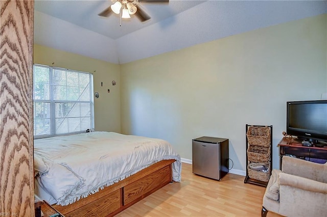 841 Masters Trl, Newport News, VA 23602 - bedroom featuring freestanding refrigerator, light wood-type flooring, baseboards, a ceiling fan, and lofted ceiling
