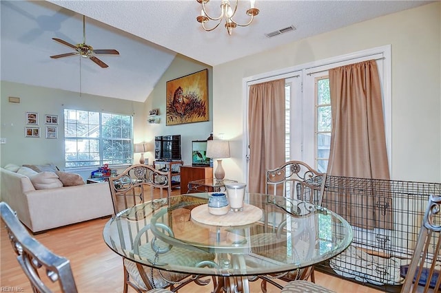841 Masters Trl, Newport News, VA 23602 - dining room featuring plenty of natural light, lofted ceiling, wood finished floors, ceiling fan, and a chandelier