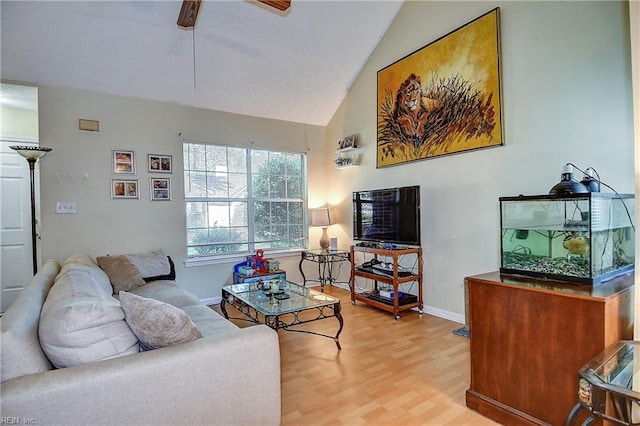 841 Masters Trl, Newport News, VA 23602 - living room featuring wood finished floors, a ceiling fan, baseboards, and high vaulted ceiling