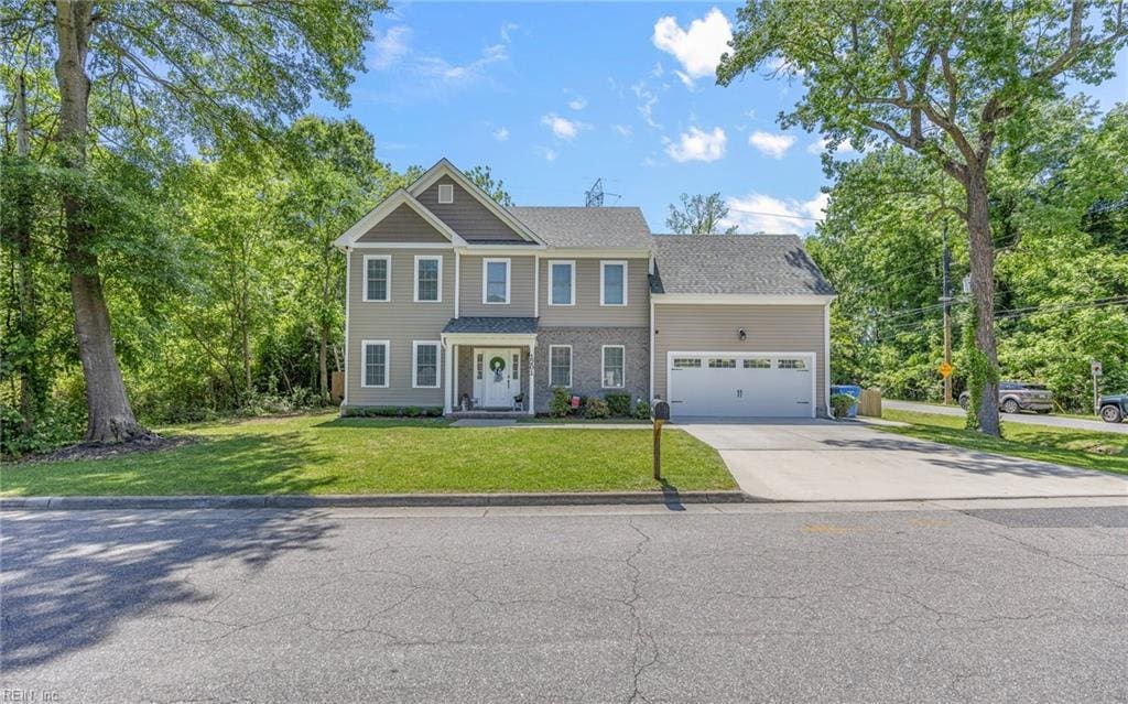 1201 Richwood Ave, Chesapeake, VA 23323 - view of front of property with driveway, a front yard, and a garage