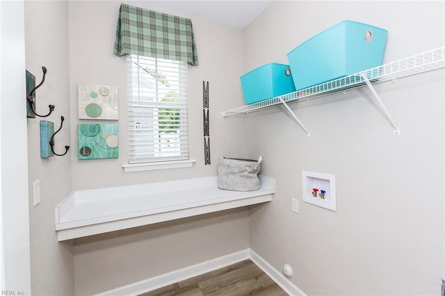 2000 Venture Way Unit B, Suffolk, VA 23434 - washroom featuring hookup for a washing machine, healthy amount of natural light, wood finished floors, and baseboards