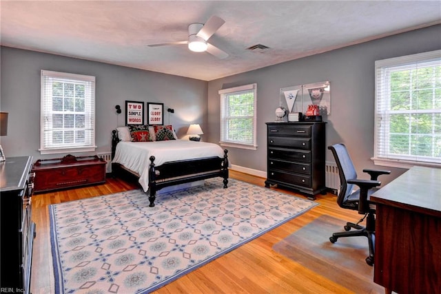 21 Westover Rd, Newport News, VA 23601 - bedroom with multiple windows, light wood-style floors, and an office area