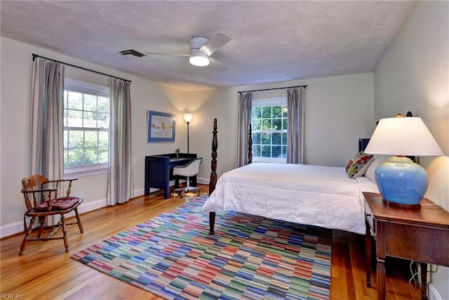 21 Westover Rd, Newport News, VA 23601 - bedroom featuring wood finished floors, baseboards, ceiling fan, and a textured ceiling