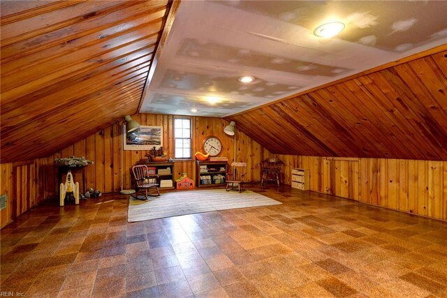 21 Westover Rd, Newport News, VA 23601 - bonus room with wood walls, tile patterned floors, and lofted ceiling