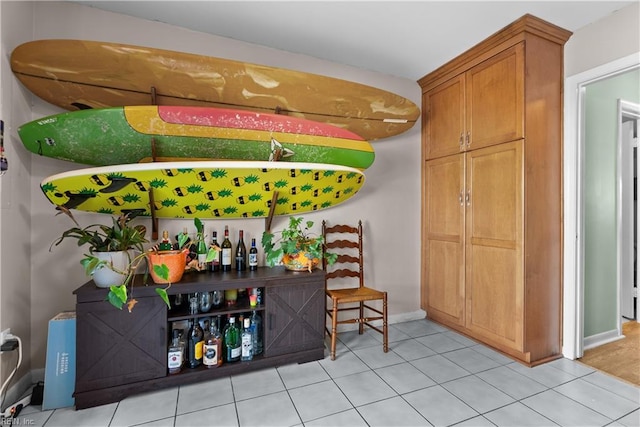 423 Burr Oak Ct, Virginia Beach, VA 23454 - bar area with baseboards and light tile patterned floors