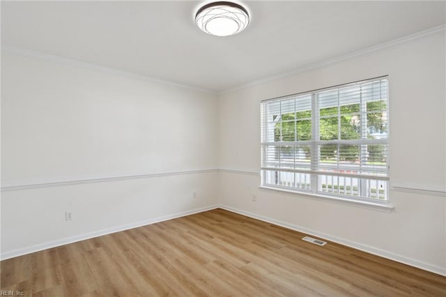 968 Speight Lyons Loop, Chesapeake, VA 23322 - spare room featuring light wood-style flooring, crown molding, and baseboards