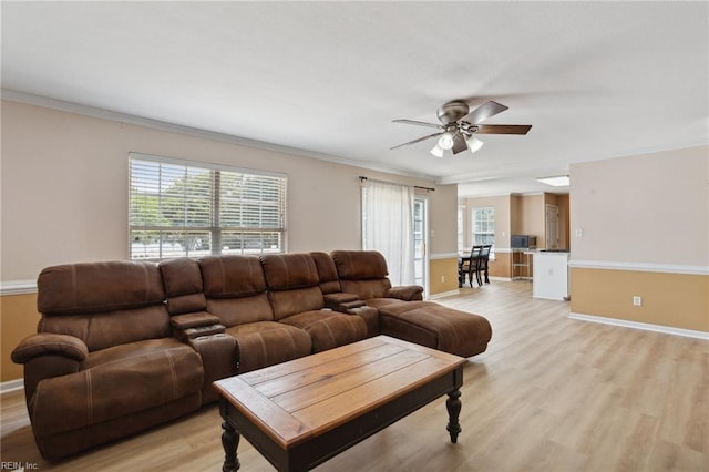 968 Speight Lyons Loop, Chesapeake, VA 23322 - living room with a ceiling fan, plenty of natural light, ornamental molding, light wood-style floors, and baseboards