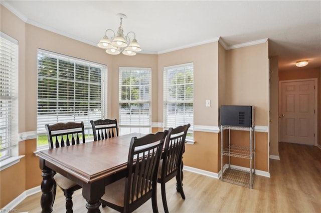 968 Speight Lyons Loop, Chesapeake, VA 23322 - dining space with light wood finished floors, a chandelier, ornamental molding, and baseboards