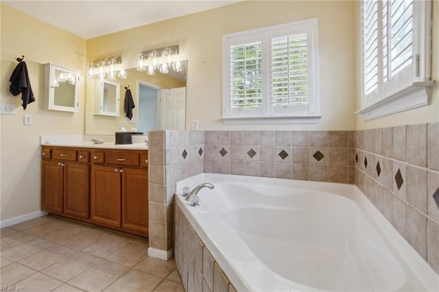 968 Speight Lyons Loop, Chesapeake, VA 23322 - bathroom featuring tile patterned flooring, double vanity, and a garden tub