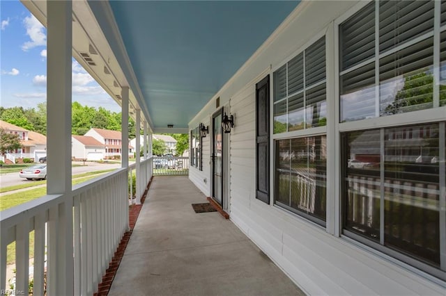 968 Speight Lyons Loop, Chesapeake, VA 23322 - view of home's exterior with a porch and a residential view