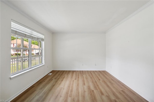 968 Speight Lyons Loop, Chesapeake, VA 23322 - spare room featuring crown molding, light wood finished floors, and baseboards