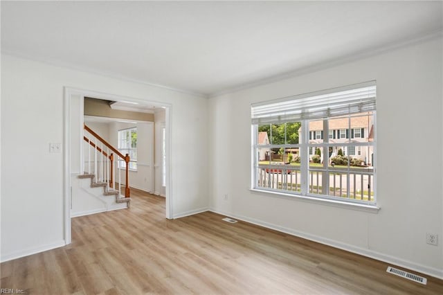 968 Speight Lyons Loop, Chesapeake, VA 23322 - spare room featuring ornamental molding, wood finished floors, stairs, and baseboards