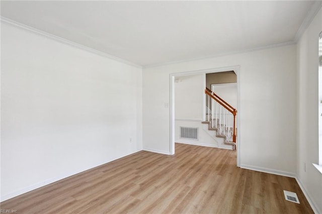 968 Speight Lyons Loop, Chesapeake, VA 23322 - empty room featuring light wood-type flooring, ornamental molding, stairs, and baseboards