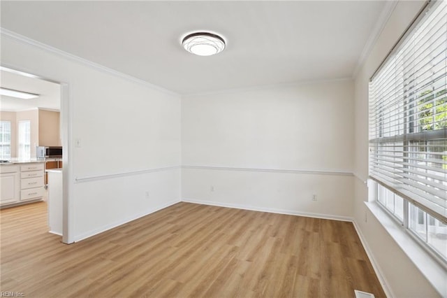 968 Speight Lyons Loop, Chesapeake, VA 23322 - unfurnished room featuring light wood-style floors, healthy amount of natural light, ornamental molding, and baseboards