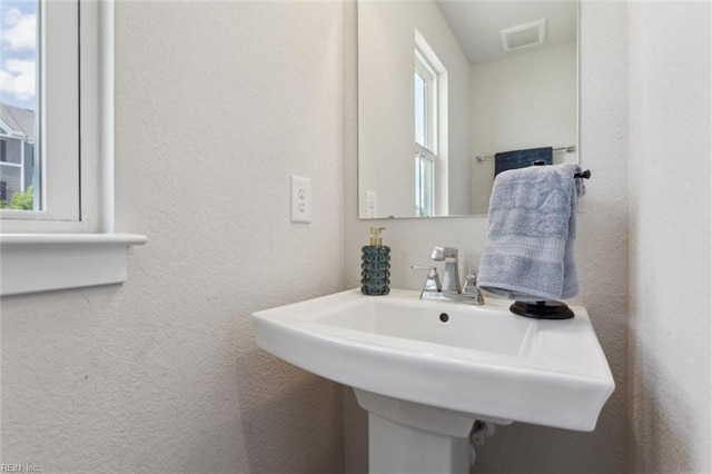 301 Sycamore Walk, Smithfield, VA 23430 - bathroom with a textured wall and a sink