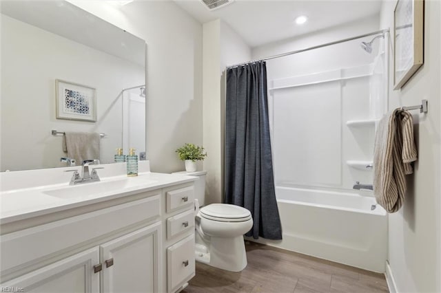 301 Sycamore Walk, Smithfield, VA 23430 - full bath featuring toilet, wood finished floors, shower / bath combo with shower curtain, vanity, and recessed lighting