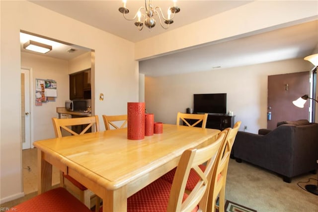1371 Granada Ct, Newport News, VA 23608 - dining room featuring a chandelier and light colored carpet
