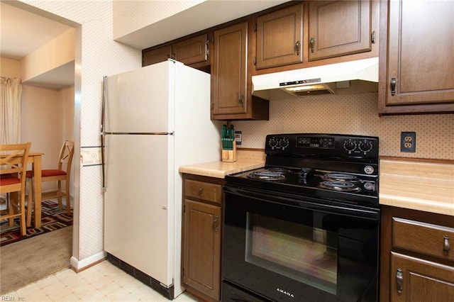 1371 Granada Ct, Newport News, VA 23608 - kitchen featuring electric range, freestanding refrigerator, under cabinet range hood, and light countertops