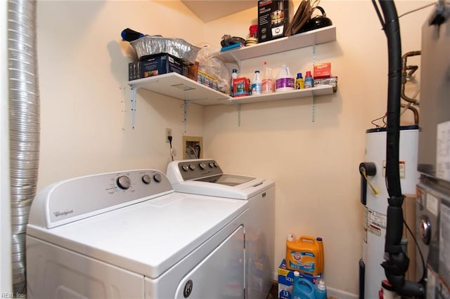 1371 Granada Ct, Newport News, VA 23608 - laundry area with water heater and washer and dryer