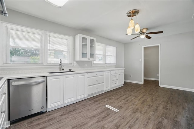 kitchen featuring dishwasher, a sink, glass insert cabinets, white cabinetry, and dark wood-style flooring
