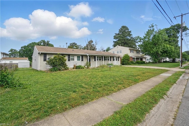 view of front of house with a front lawn