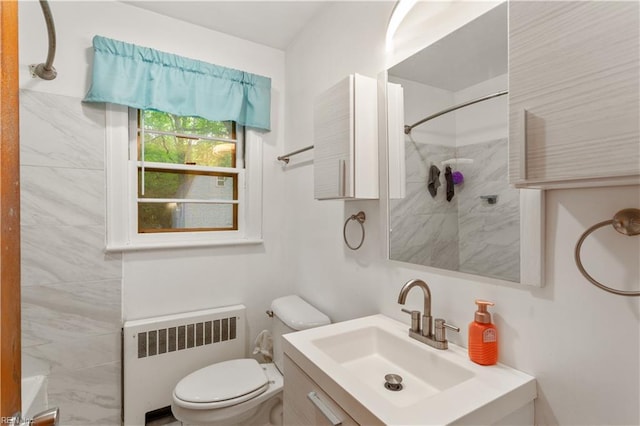 13 Omera Pl, Hampton, VA 23666 - bathroom featuring radiator, toilet, a shower, and vanity