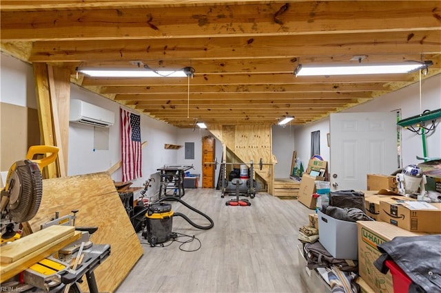 13 Omera Pl, Hampton, VA 23666 - finished below grade area featuring wood finished floors, electric panel, and a wall unit AC
