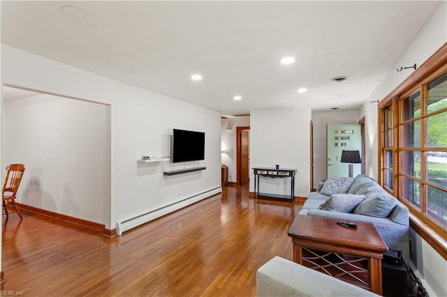 13 Omera Pl, Hampton, VA 23666 - living room with a baseboard radiator, wood finished floors, recessed lighting, and baseboards