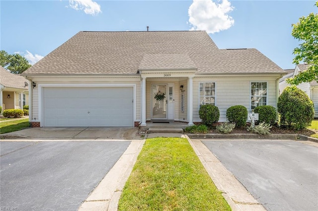 3009 Hogan Way, Suffolk, VA 23435 - view of front of property featuring roof with shingles, driveway, and an attached garage