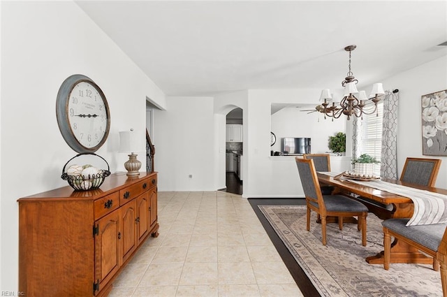 3009 Hogan Way, Suffolk, VA 23435 - dining area with a chandelier, arched walkways, and light tile patterned flooring