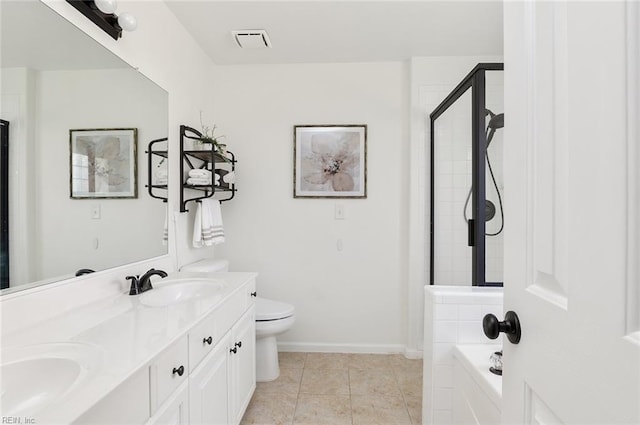 3009 Hogan Way, Suffolk, VA 23435 - bathroom with a walk in shower, double vanity, toilet, tile patterned flooring, and baseboards
