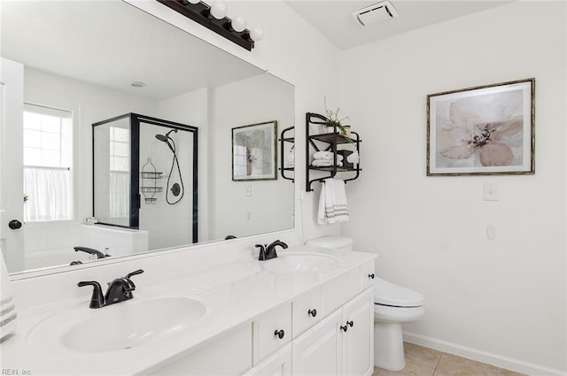 3009 Hogan Way, Suffolk, VA 23435 - bathroom with a stall shower, toilet, double vanity, tile patterned floors, and baseboards