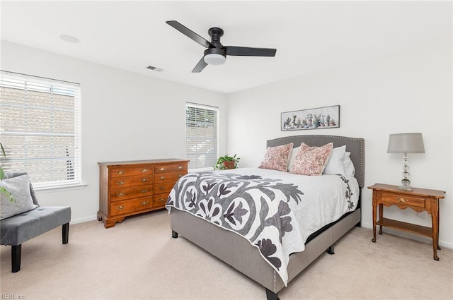 3009 Hogan Way, Suffolk, VA 23435 - bedroom with light colored carpet, baseboards, and ceiling fan